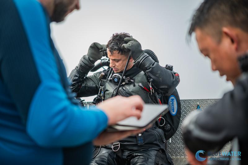 Norbert and Daniel record marine life destroyed by the ghost net while Nir gets out of his rebreather to help pull in the net Norbert and Daniel record marine life destroyed by the ghost net while Nir gets out of his rebreather to help pull in the net